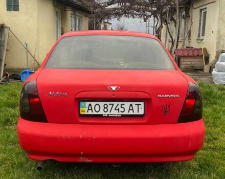 Красный Дэу Нубира, объемом двигателя 1.6 л и пробегом 180 тыс. км за 1050 $, фото 1 на Automoto.ua