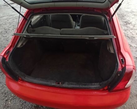 Деу Нубіра 1998 у Люботине на Automoto.ua Червоний Деу Нубіра, об'ємом двигуна 1.6 л та пробігом 225 тис. км за 1800 $, фото 13 на Automoto.ua