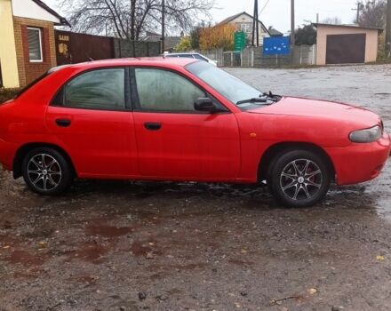 Деу Нубіра 1998 у Люботине на Automoto.ua Червоний Деу Нубіра, об'ємом двигуна 1.6 л та пробігом 225 тис. км за 1800 $, фото 1 на Automoto.ua