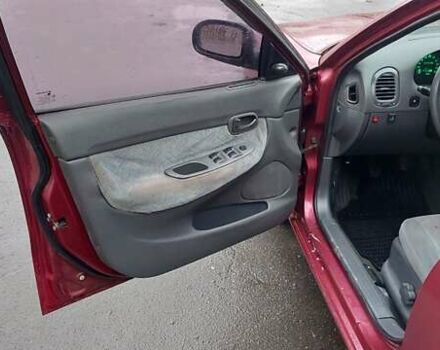 Червоний Деу Нубіра, об'ємом двигуна 1.6 л та пробігом 201 тис. км за 1650 $, фото 7 на Automoto.ua