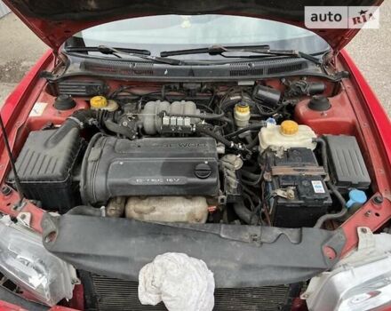 Красный Дэу Нубира, объемом двигателя 1.6 л и пробегом 224 тыс. км за 1200 $, фото 6 на Automoto.ua