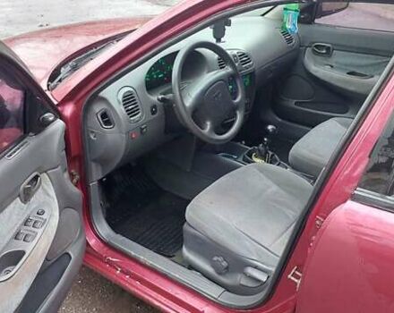 Червоний Деу Нубіра, об'ємом двигуна 1.6 л та пробігом 201 тис. км за 1650 $, фото 6 на Automoto.ua