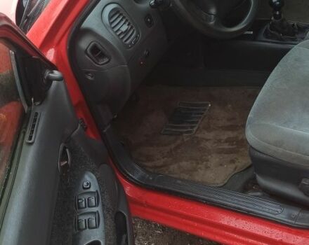 Деу Нубіра 1998 у Люботине на Automoto.ua Червоний Деу Нубіра, об'ємом двигуна 1.6 л та пробігом 225 тис. км за 1800 $, фото 6 на Automoto.ua