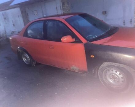 Червоний Деу Нубіра, об'ємом двигуна 1.6 л та пробігом 270 тис. км за 1100 $, фото 3 на Automoto.ua