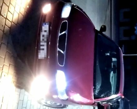 Красный Дэу Нубира, объемом двигателя 1.6 л и пробегом 155 тыс. км за 2000 $, фото 1 на Automoto.ua