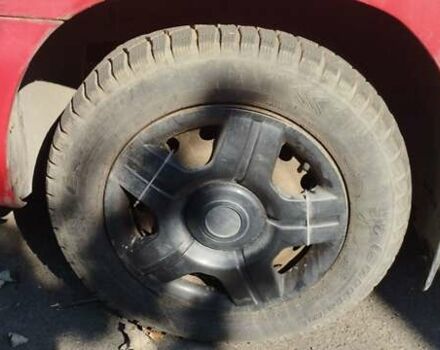 Красный Дэу Нубира, объемом двигателя 1.6 л и пробегом 346 тыс. км за 1500 $, фото 4 на Automoto.ua