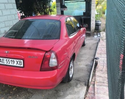 Красный Дэу Нубира, объемом двигателя 1.6 л и пробегом 330 тыс. км за 1100 $, фото 3 на Automoto.ua