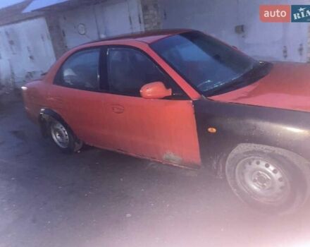 Червоний Деу Нубіра, об'ємом двигуна 1.6 л та пробігом 270 тис. км за 900 $, фото 2 на Automoto.ua