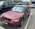 Красный Дэу Нубира, объемом двигателя 1.6 л и пробегом 260 тыс. км за 1300 $, фото 2 на Automoto.ua