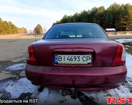 Червоний Деу Нубіра, об'ємом двигуна 1.6 л та пробігом 185 тис. км за 1350 $, фото 5 на Automoto.ua