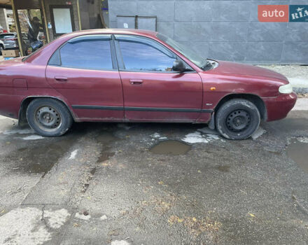 Деу Нубіра 1998 у Києві на Automoto.ua Червоний Деу Нубіра, об'ємом двигуна 1.6 л та пробігом 100 тис. км за 1500 $, фото 6 на Automoto.ua