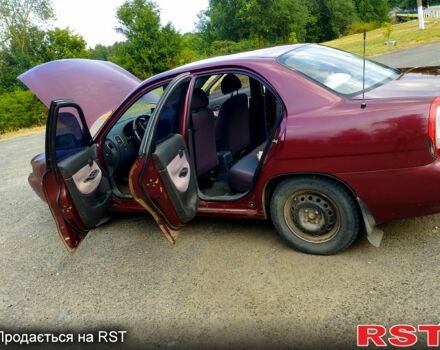 Красный Дэу Нубира, объемом двигателя 1.6 л и пробегом 220 тыс. км за 2500 $, фото 4 на Automoto.ua