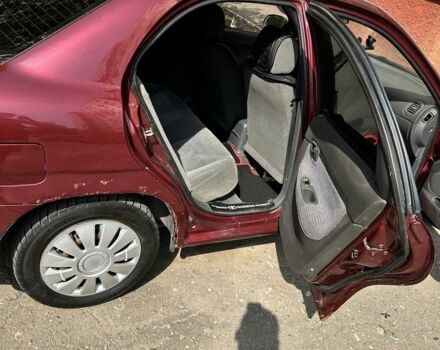 Красный Дэу Нубира, объемом двигателя 1.6 л и пробегом 284 тыс. км за 1600 $, фото 4 на Automoto.ua