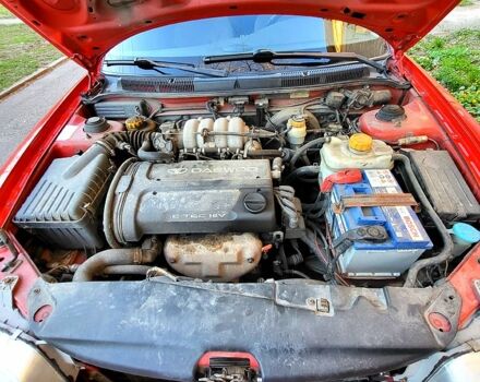 Красный Дэу Нубира, объемом двигателя 1.6 л и пробегом 222 тыс. км за 3300 $, фото 6 на Automoto.ua