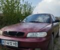Красный Дэу Нубира, объемом двигателя 2 л и пробегом 200 тыс. км за 1100 $, фото 1 на Automoto.ua
