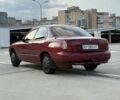 Красный Дэу Нубира, объемом двигателя 1.6 л и пробегом 234 тыс. км за 1650 $, фото 5 на Automoto.ua