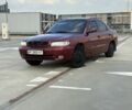 Красный Дэу Нубира, объемом двигателя 1.6 л и пробегом 234 тыс. км за 1900 $, фото 1 на Automoto.ua