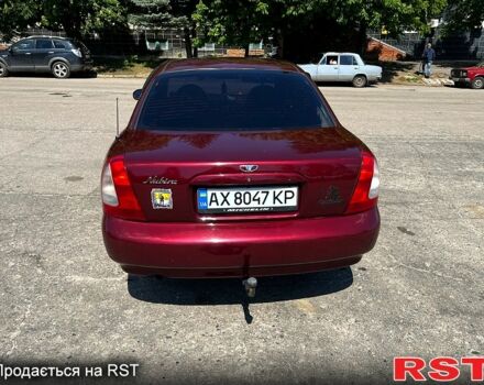 Красный Дэу Нубира, объемом двигателя 1.6 л и пробегом 336 тыс. км за 2050 $, фото 2 на Automoto.ua