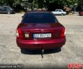 Красный Дэу Нубира, объемом двигателя 1.6 л и пробегом 336 тыс. км за 2050 $, фото 2 на Automoto.ua