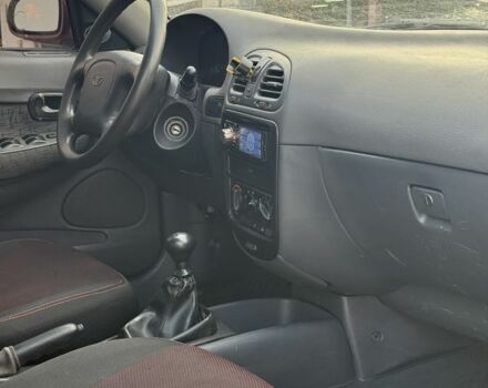 Красный Дэу Нубира, объемом двигателя 1.6 л и пробегом 234 тыс. км за 1650 $, фото 8 на Automoto.ua