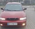 Красный Дэу Нубира, объемом двигателя 1.6 л и пробегом 200 тыс. км за 2655 $, фото 1 на Automoto.ua
