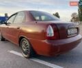 Красный Дэу Нубира, объемом двигателя 2 л и пробегом 300 тыс. км за 1100 $, фото 3 на Automoto.ua