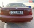 Красный Дэу Нубира, объемом двигателя 2 л и пробегом 300 тыс. км за 1100 $, фото 2 на Automoto.ua
