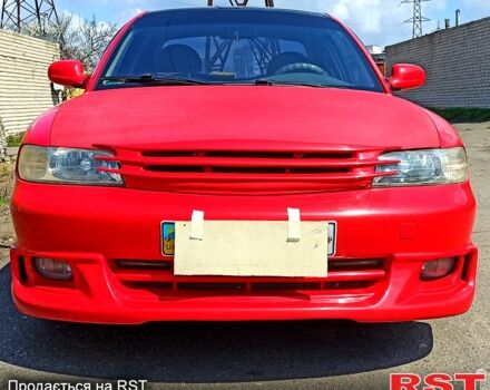 Красный Дэу Нубира, объемом двигателя 1.6 л и пробегом 195 тыс. км за 3500 $, фото 3 на Automoto.ua