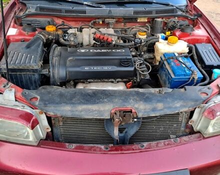 Красный Дэу Нубира, объемом двигателя 1.6 л и пробегом 580 тыс. км за 1100 $, фото 3 на Automoto.ua