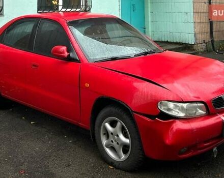 Червоний Деу Нубіра, об'ємом двигуна 1.6 л та пробігом 230 тис. км за 1100 $, фото 2 на Automoto.ua