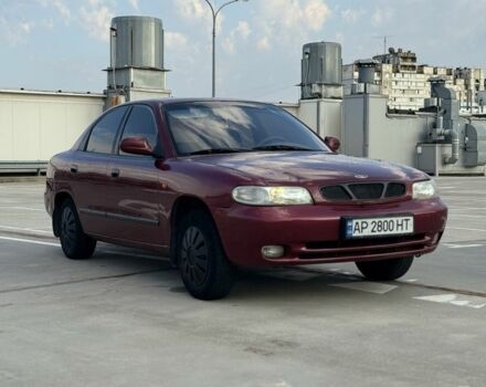 Красный Дэу Нубира, объемом двигателя 1.6 л и пробегом 234 тыс. км за 1650 $, фото 2 на Automoto.ua