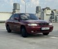 Красный Дэу Нубира, объемом двигателя 1.6 л и пробегом 234 тыс. км за 1650 $, фото 2 на Automoto.ua