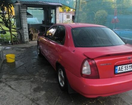 Красный Дэу Нубира, объемом двигателя 1.6 л и пробегом 330 тыс. км за 1100 $, фото 2 на Automoto.ua