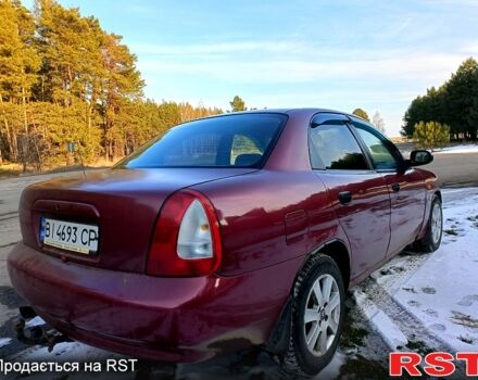 Червоний Деу Нубіра, об'ємом двигуна 1.6 л та пробігом 185 тис. км за 1350 $, фото 4 на Automoto.ua
