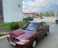 Красный Дэу Нубира, объемом двигателя 1.6 л и пробегом 195 тыс. км за 1650 $, фото 4 на Automoto.ua