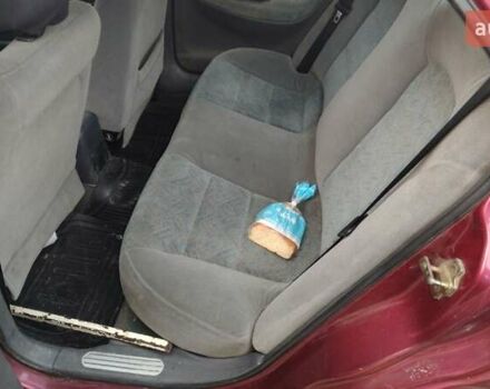 Червоний Деу Нубіра, об'ємом двигуна 1.6 л та пробігом 300 тис. км за 1200 $, фото 2 на Automoto.ua