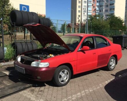 Червоний Деу Нубіра, об'ємом двигуна 1.6 л та пробігом 2 тис. км за 952 $, фото 4 на Automoto.ua