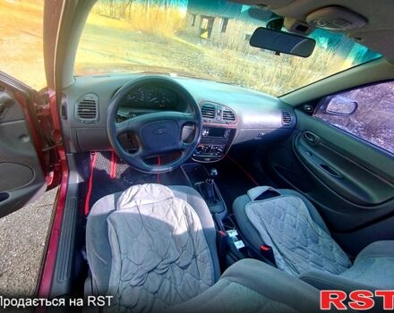 Красный Дэу Нубира, объемом двигателя 1.6 л и пробегом 123 тыс. км за 2250 $, фото 1 на Automoto.ua
