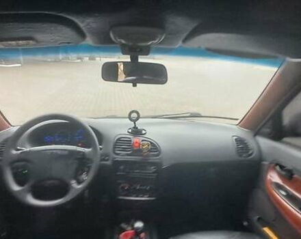 Красный Дэу Нубира, объемом двигателя 1.6 л и пробегом 200 тыс. км за 2655 $, фото 8 на Automoto.ua