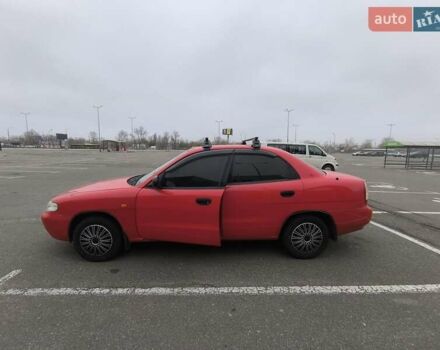 Червоний Деу Нубіра, об'ємом двигуна 1.6 л та пробігом 136 тис. км за 3000 $, фото 3 на Automoto.ua