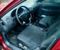 Красный Дэу Нубира, объемом двигателя 1.6 л и пробегом 250 тыс. км за 3000 $, фото 1 на Automoto.ua
