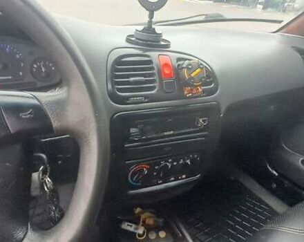 Красный Дэу Нубира, объемом двигателя 1.6 л и пробегом 200 тыс. км за 2655 $, фото 10 на Automoto.ua