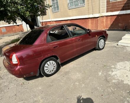 Красный Дэу Нубира, объемом двигателя 1.6 л и пробегом 284 тыс. км за 1600 $, фото 2 на Automoto.ua