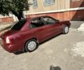 Красный Дэу Нубира, объемом двигателя 1.6 л и пробегом 284 тыс. км за 1600 $, фото 2 на Automoto.ua