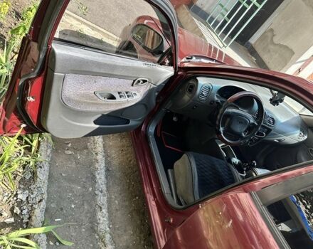 Красный Дэу Нубира, объемом двигателя 1.6 л и пробегом 284 тыс. км за 1600 $, фото 5 на Automoto.ua