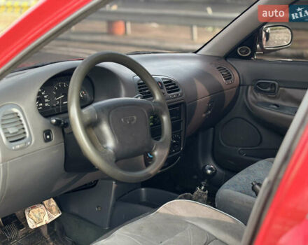 Червоний Деу Нубіра, об'ємом двигуна 1.6 л та пробігом 180 тис. км за 1750 $, фото 8 на Automoto.ua