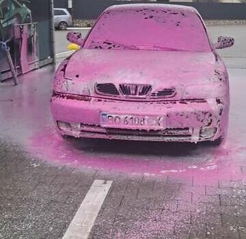 Красный Дэу Нубира, объемом двигателя 1.6 л и пробегом 200 тыс. км за 2655 $, фото 3 на Automoto.ua