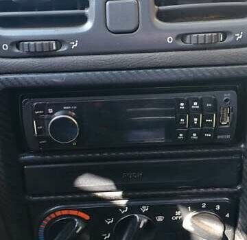 Красный Дэу Нубира, объемом двигателя 1.6 л и пробегом 346 тыс. км за 1500 $, фото 5 на Automoto.ua