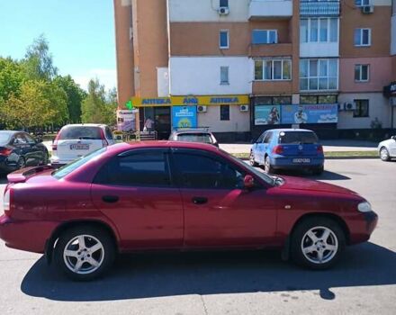 Красный Дэу Нубира, объемом двигателя 1.6 л и пробегом 306 тыс. км за 1500 $, фото 2 на Automoto.ua