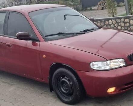 Красный Дэу Нубира, объемом двигателя 1.6 л и пробегом 200 тыс. км за 2655 $, фото 6 на Automoto.ua